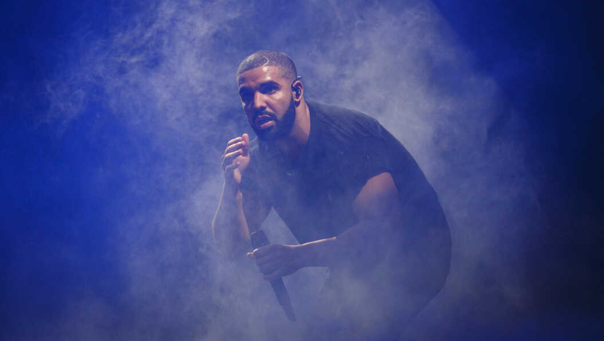 drake performing on stage