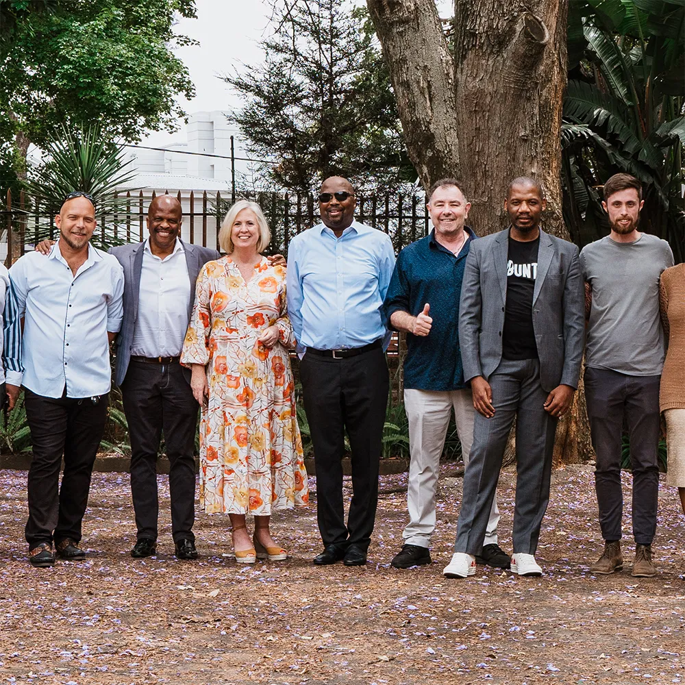 A group of people standing side-by-side for a photo