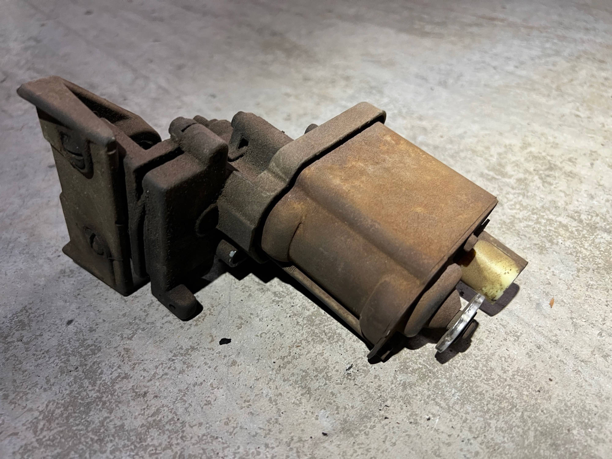 Corvette headlight motor before restoration