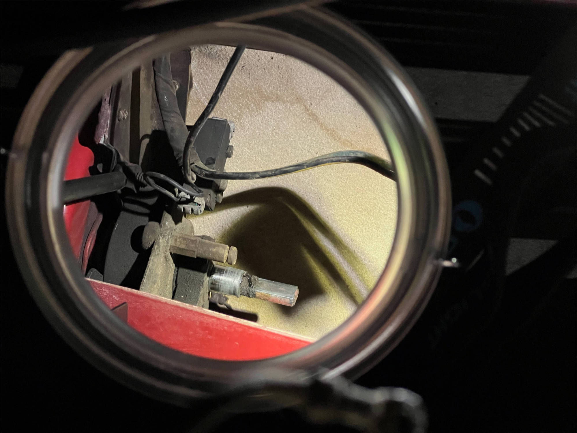 Removing Corvette headlight motor using mirror