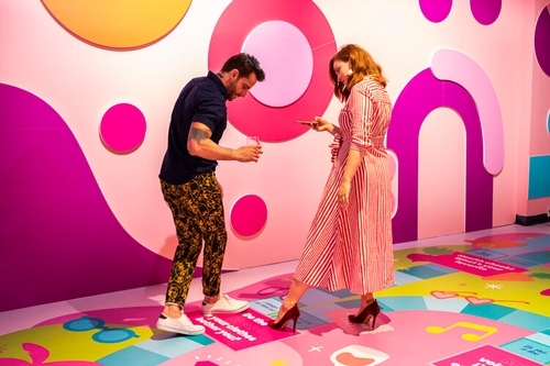 rose mansion-pop-up-design-people in game room