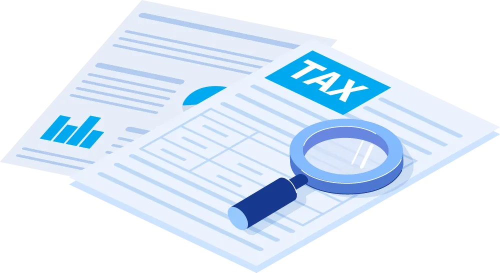A magnifying glass is placed on a piece of paper with the word tax written on it.