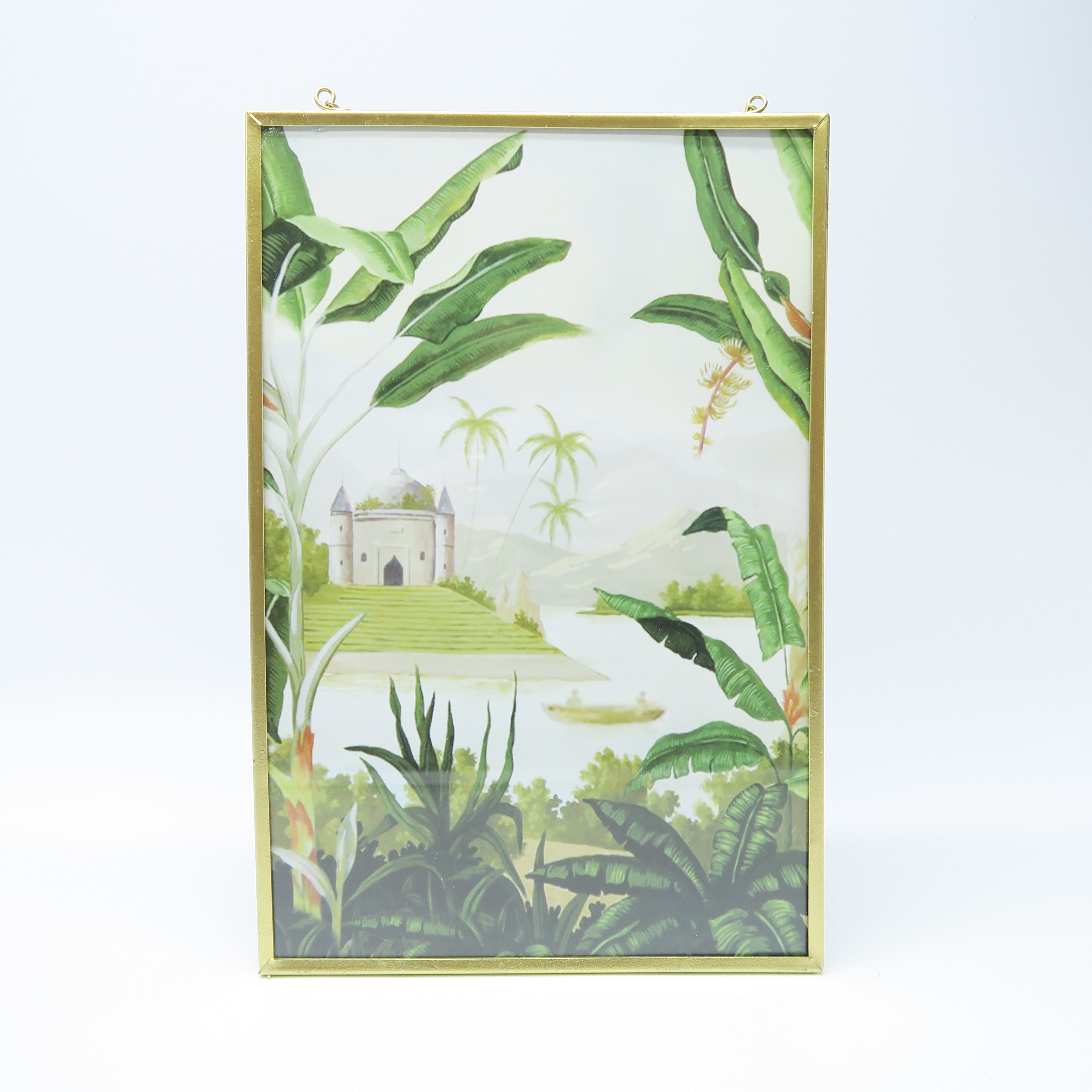 cadre doré à chaîne et jardin tropical 