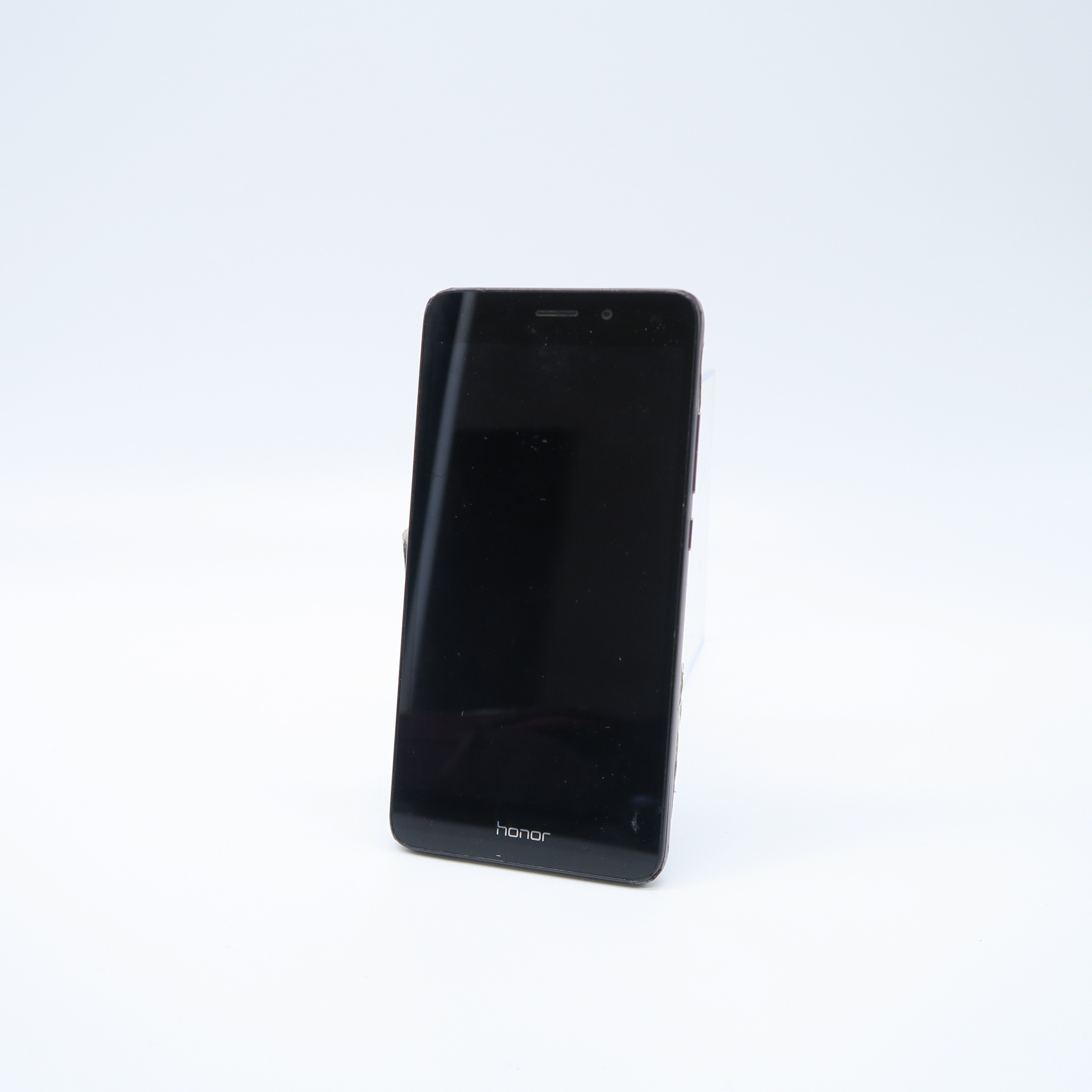 gsm 'alcaltel' et autocollants au dos 