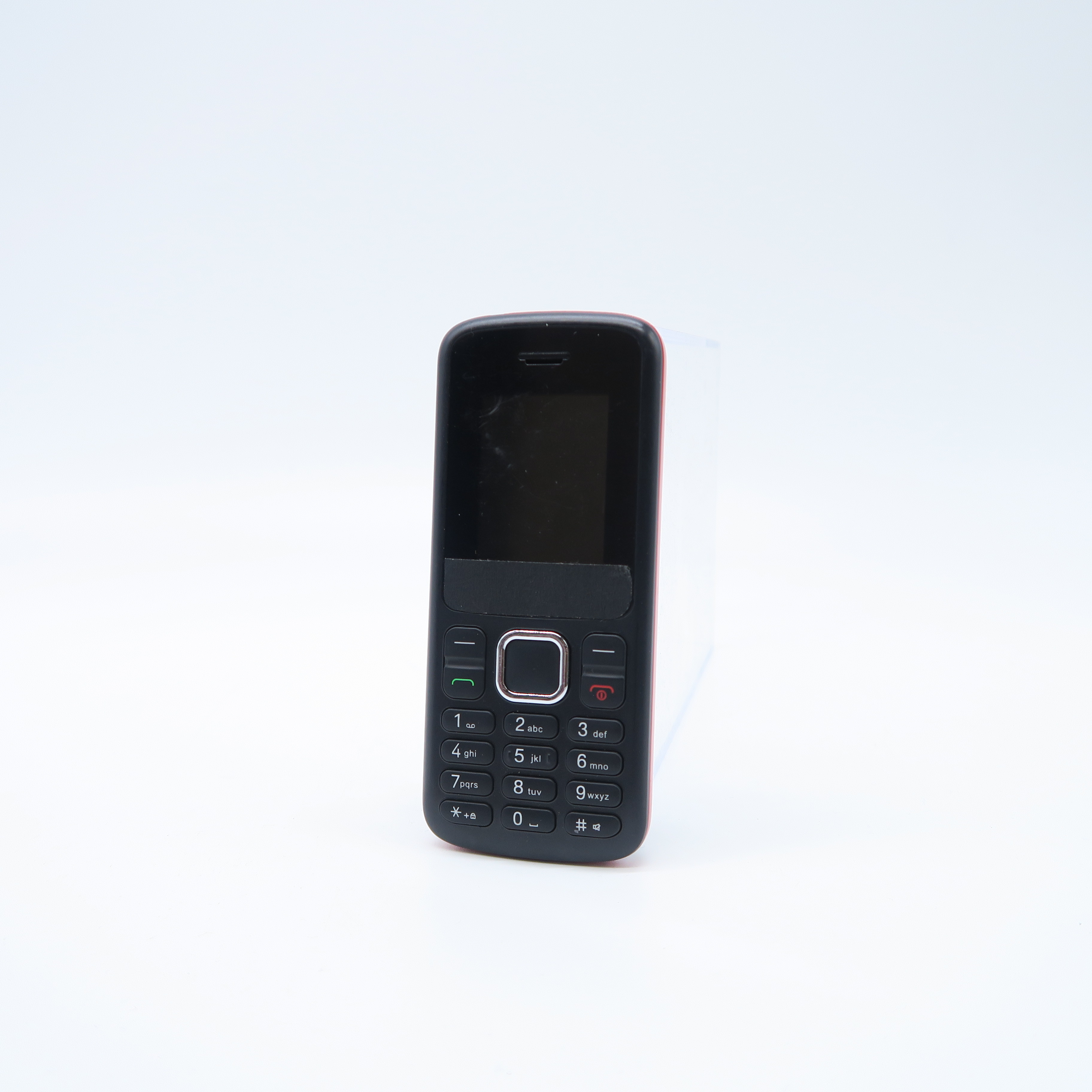 petit gsm à touches coque rouge 