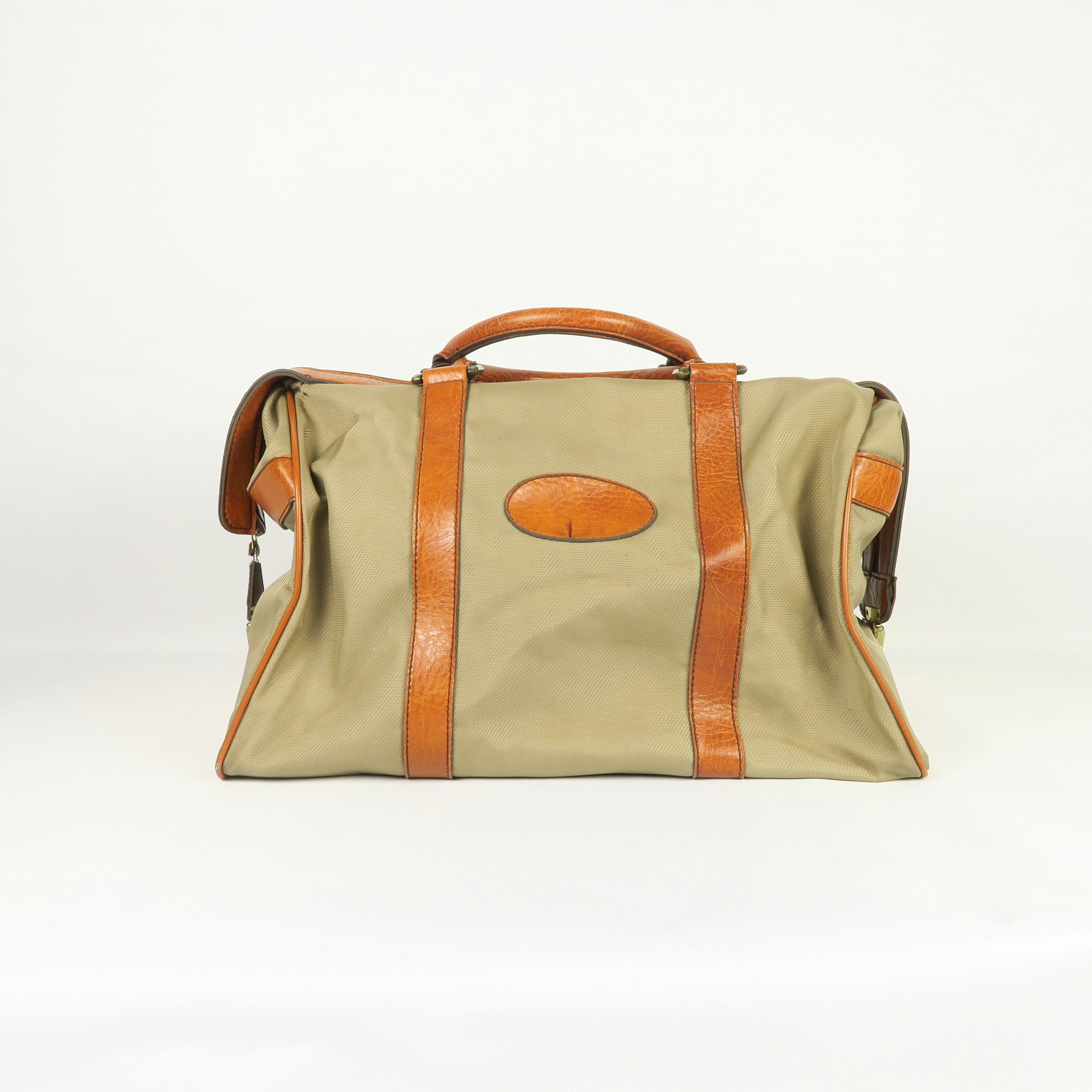 sac de voyage beige et contour camel 
