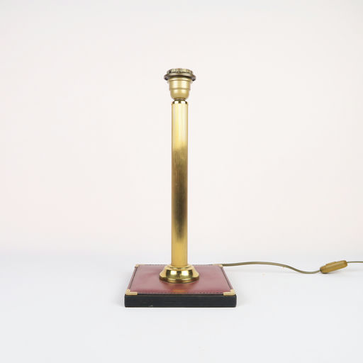 pied de lampe doré et cuir rouge 