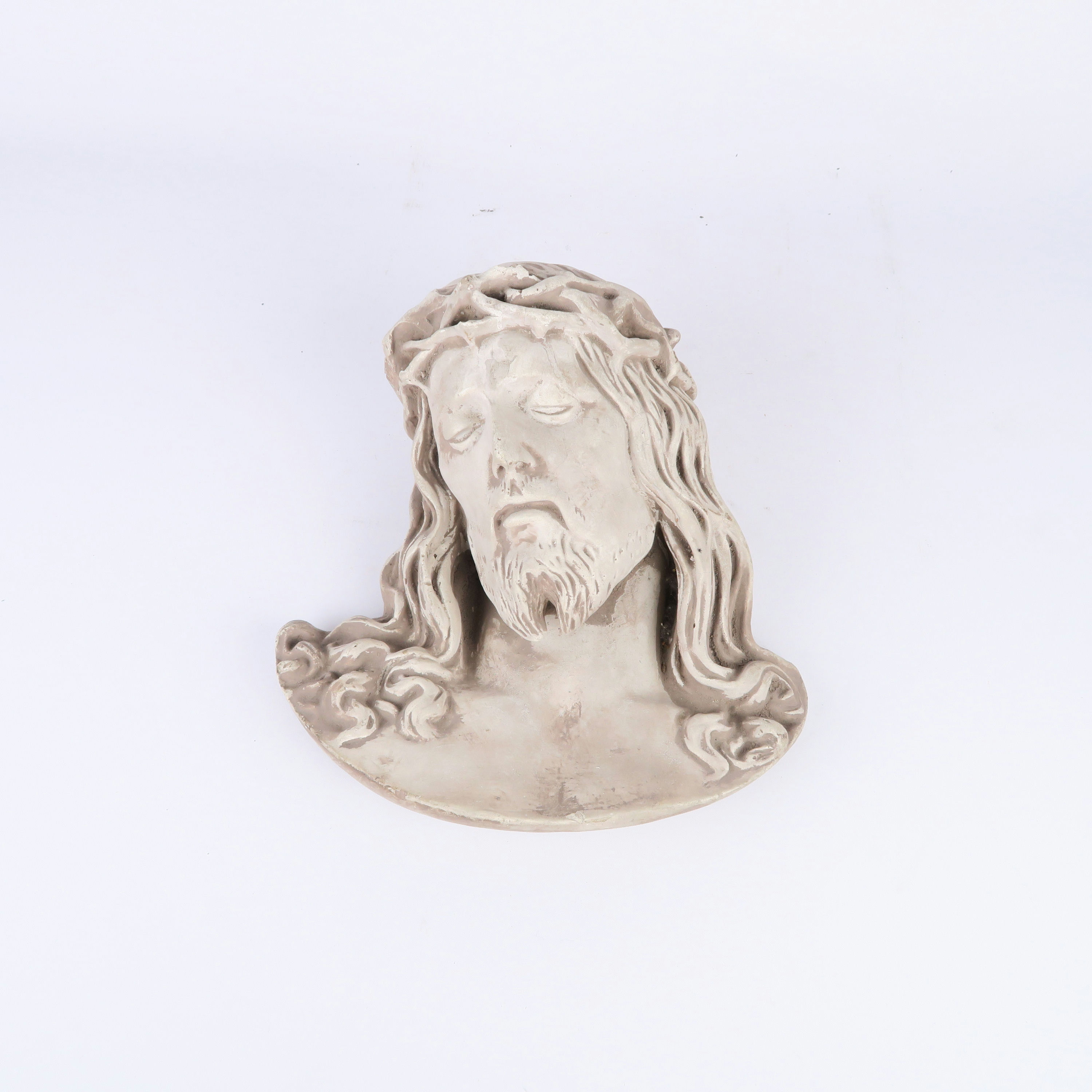 visage du christ couronné d'épines