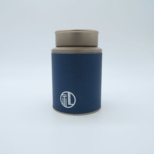 boîte de thé en métal bleu et argenté