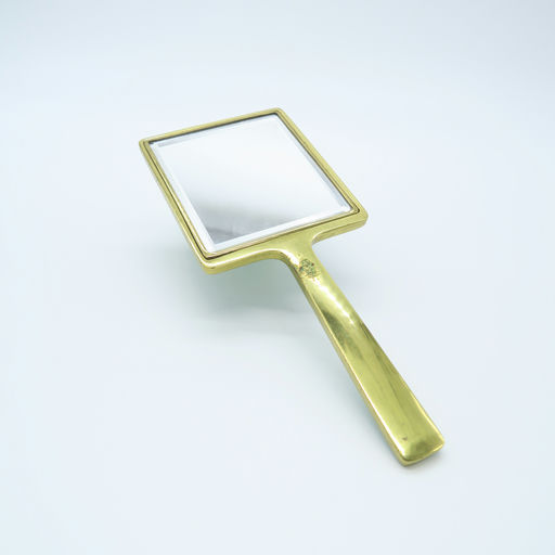 miroir à main doré et vert