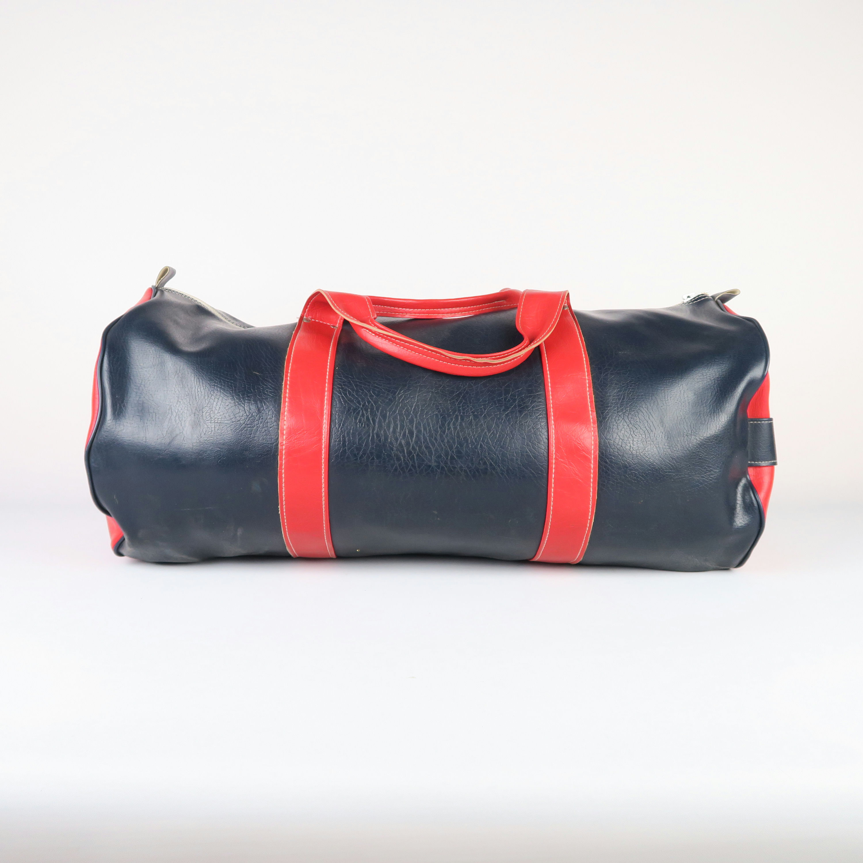 sac de voyage en cuir bleu et rouge