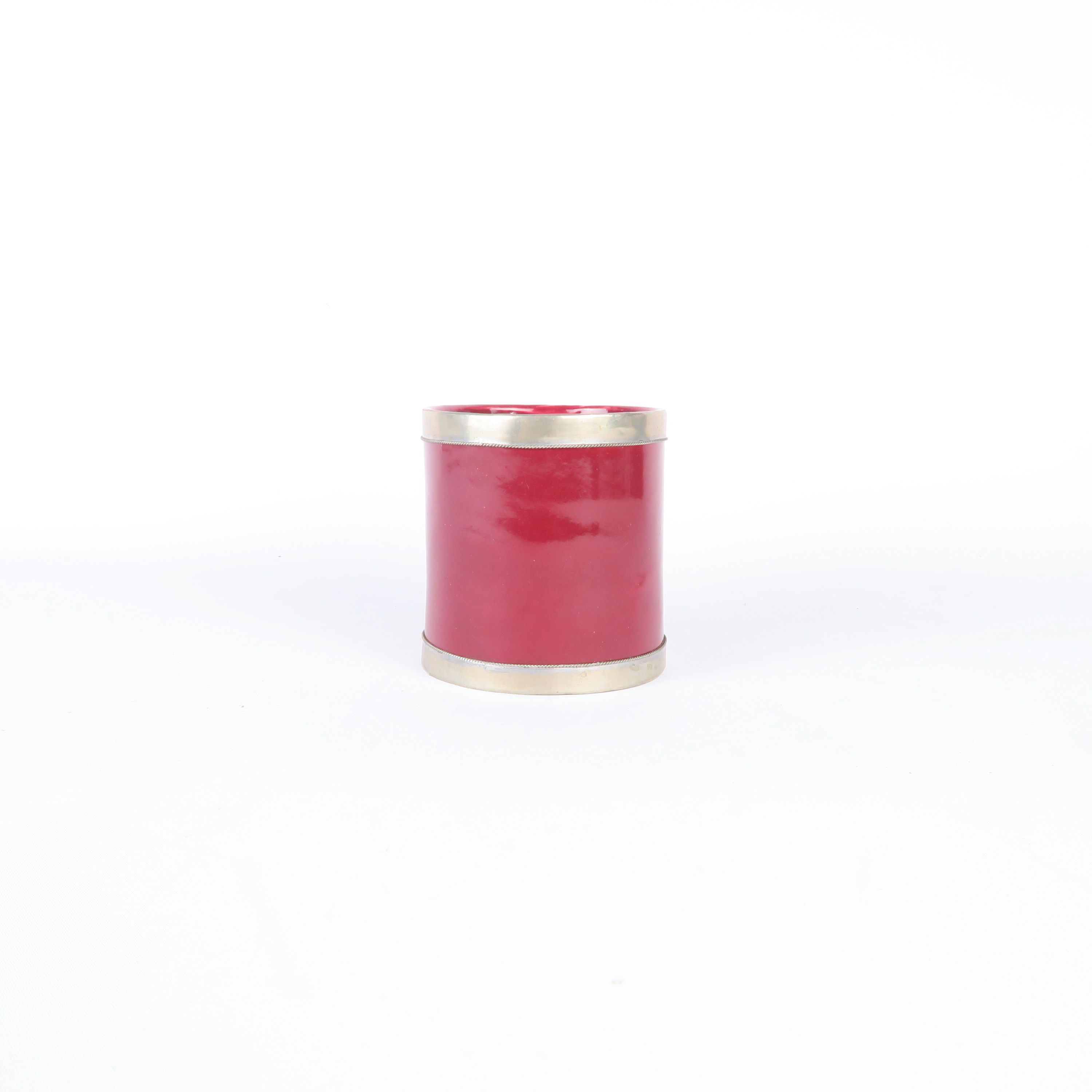 pot en céramique rouge et bordures dorées 