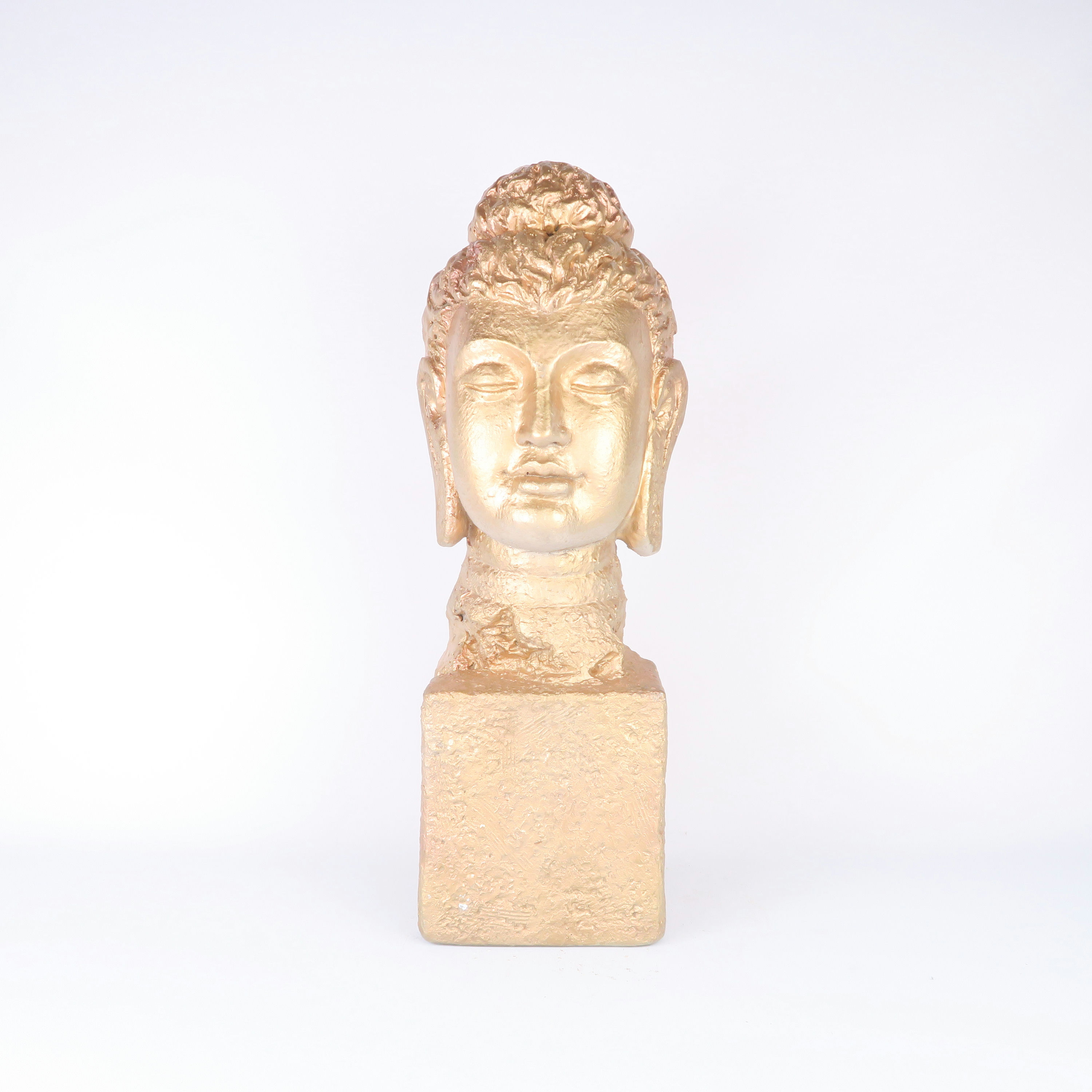 représentation de tête de buddah en plâtre doré 