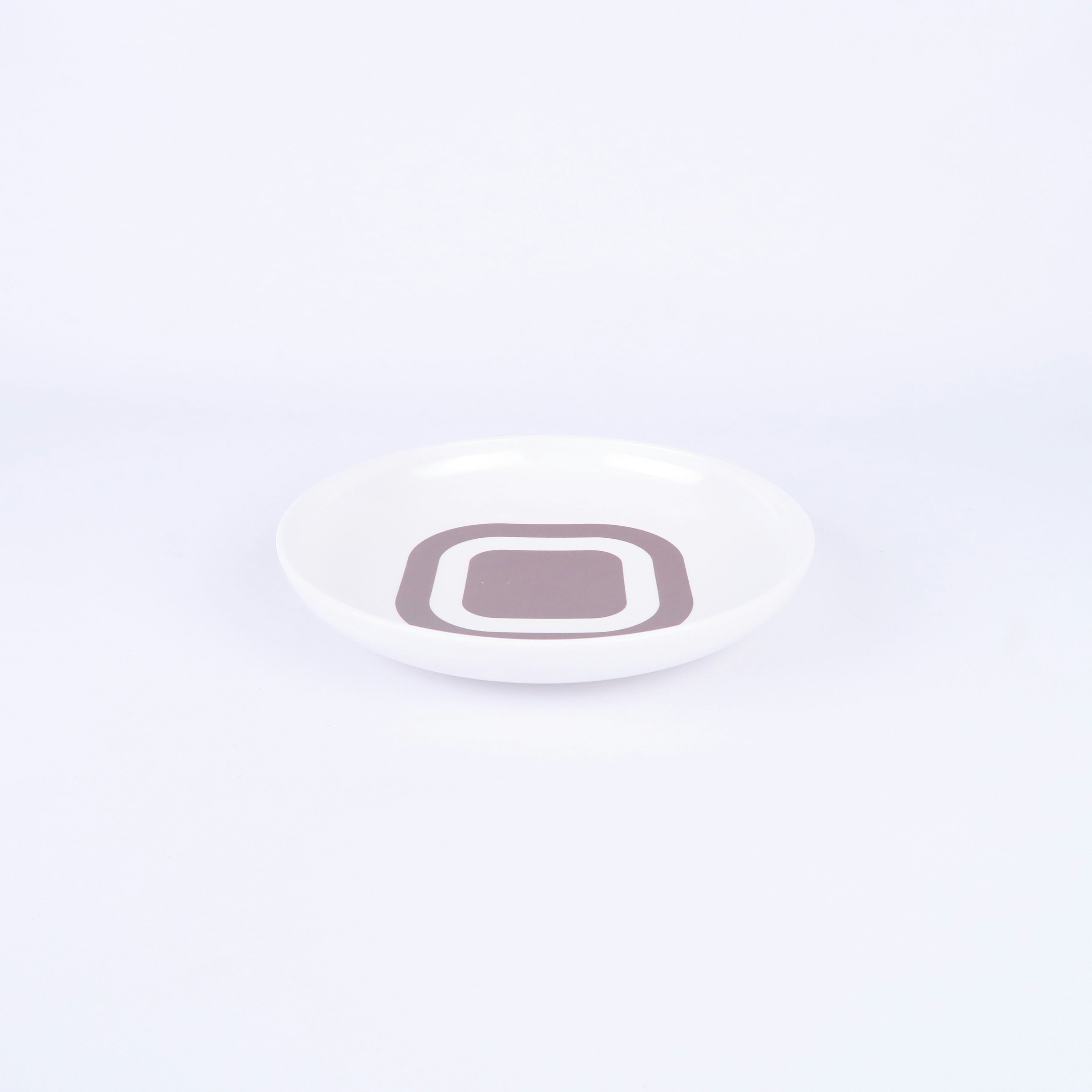 assiette creuse en plastique motif géométrique brun et blanc