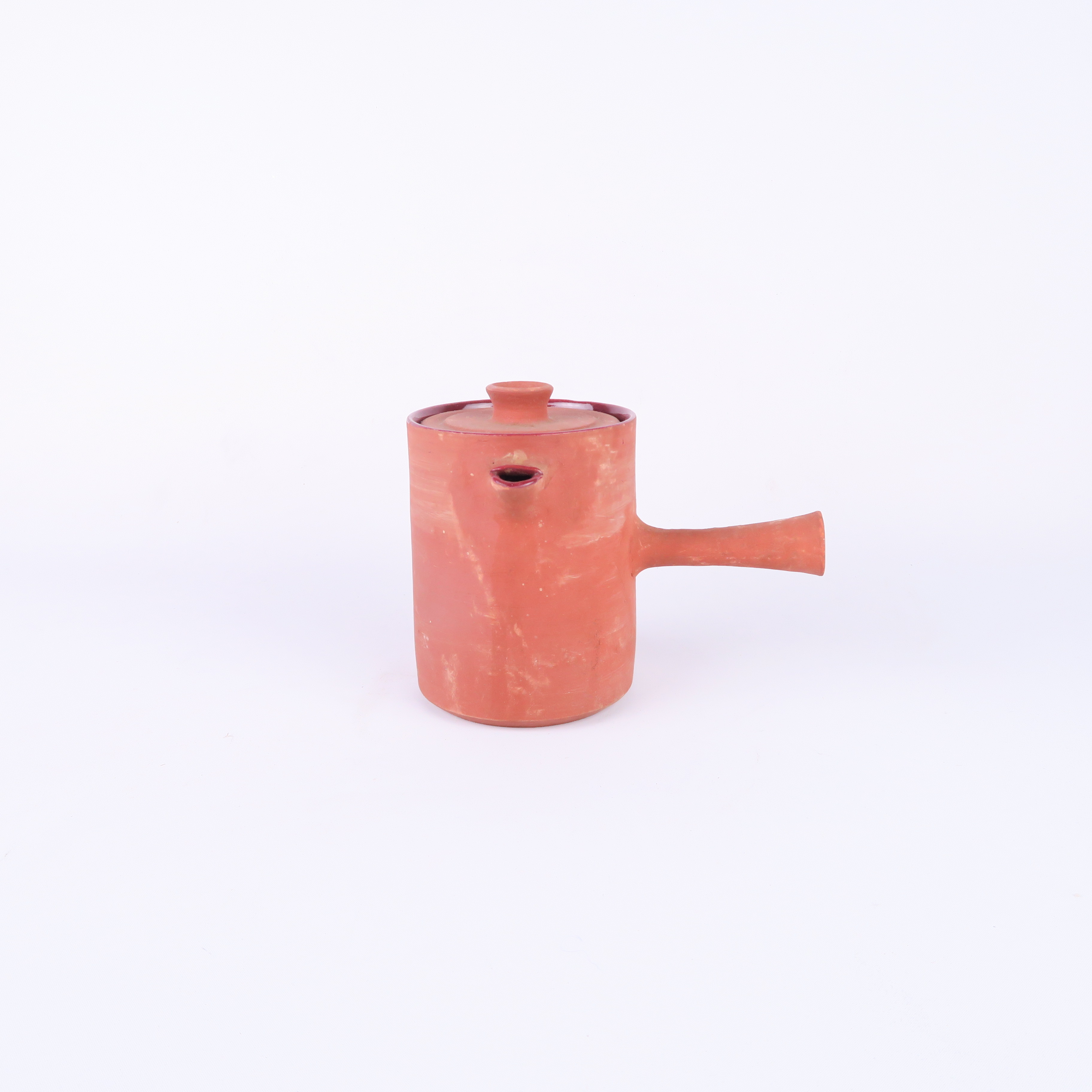 théière en terre cuite et intérieur émaillé rouge