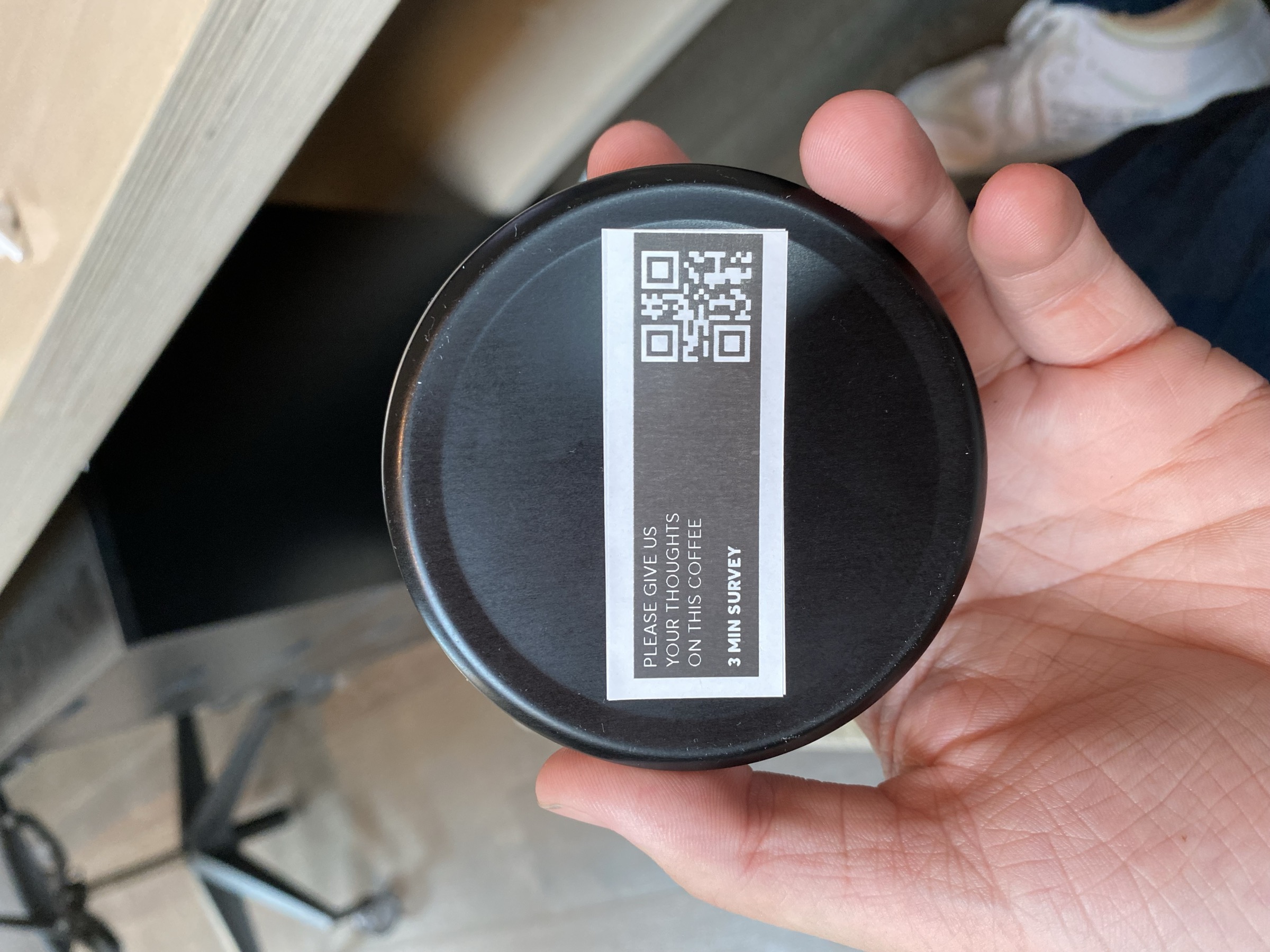 A survey code on the coffee tin.