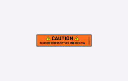 Graphic depicting the 4" width variation of Signaltape® Underground Warning Tape for fiber optic lines.