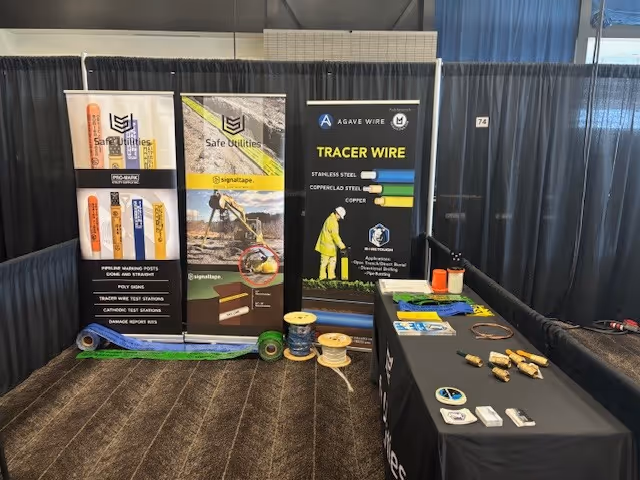 Image of Safe Utilities Booth at the Western Canada Water. Booth display includes Signaltape® Underground Warning Tape