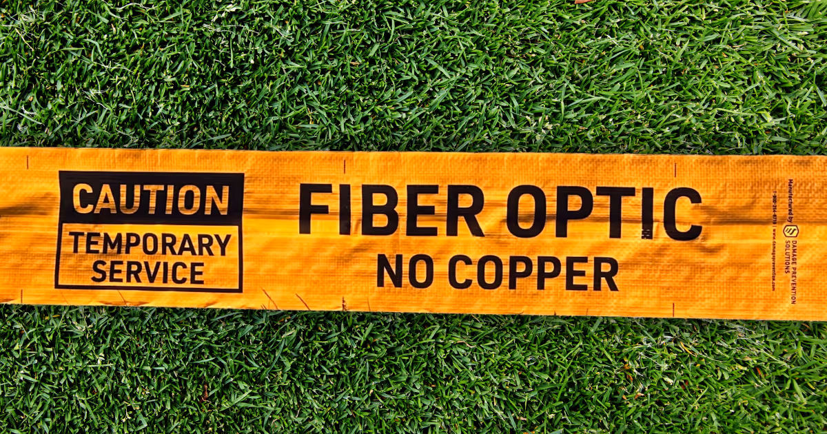 Close up image of Channeltape(TM) Utility Identification Sleeve being used above ground