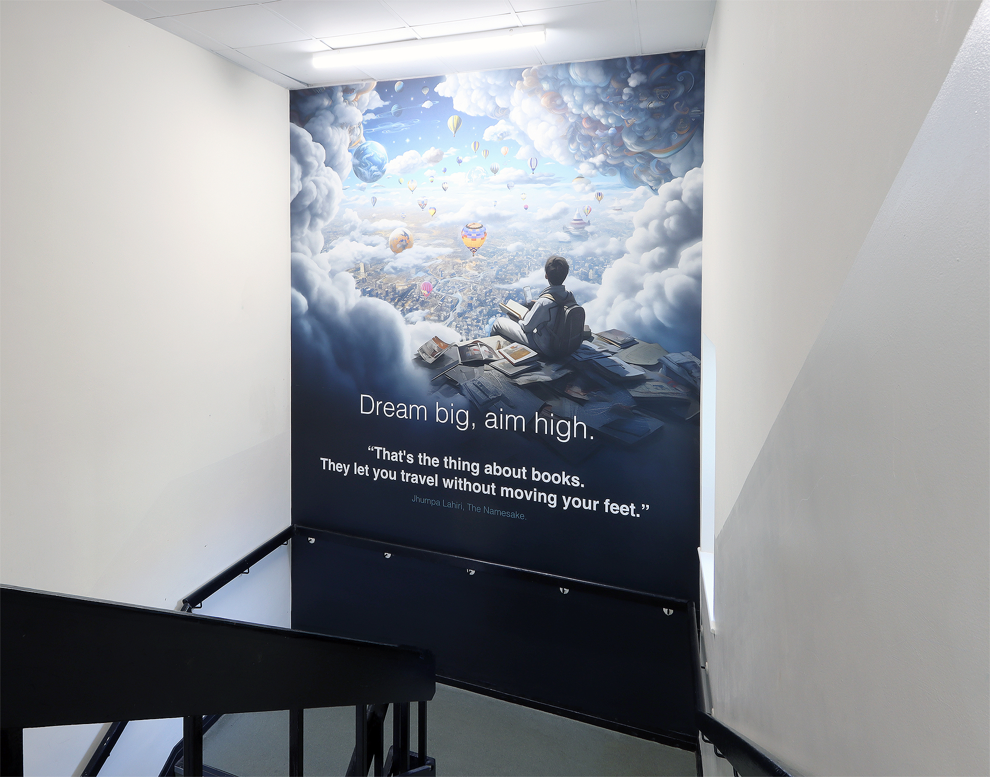 This wall wrap completely transforms the staircase at Ysgol Greenhill by turning an ordinary space into an uplifting and motivational focal point, creating a visually engaging environment that energises students as they move between lessons. Its inspiring message, "Dream big, aim high" fosters positivity and ambition, making the staircase not just a place of transition but a source of daily encouragement.