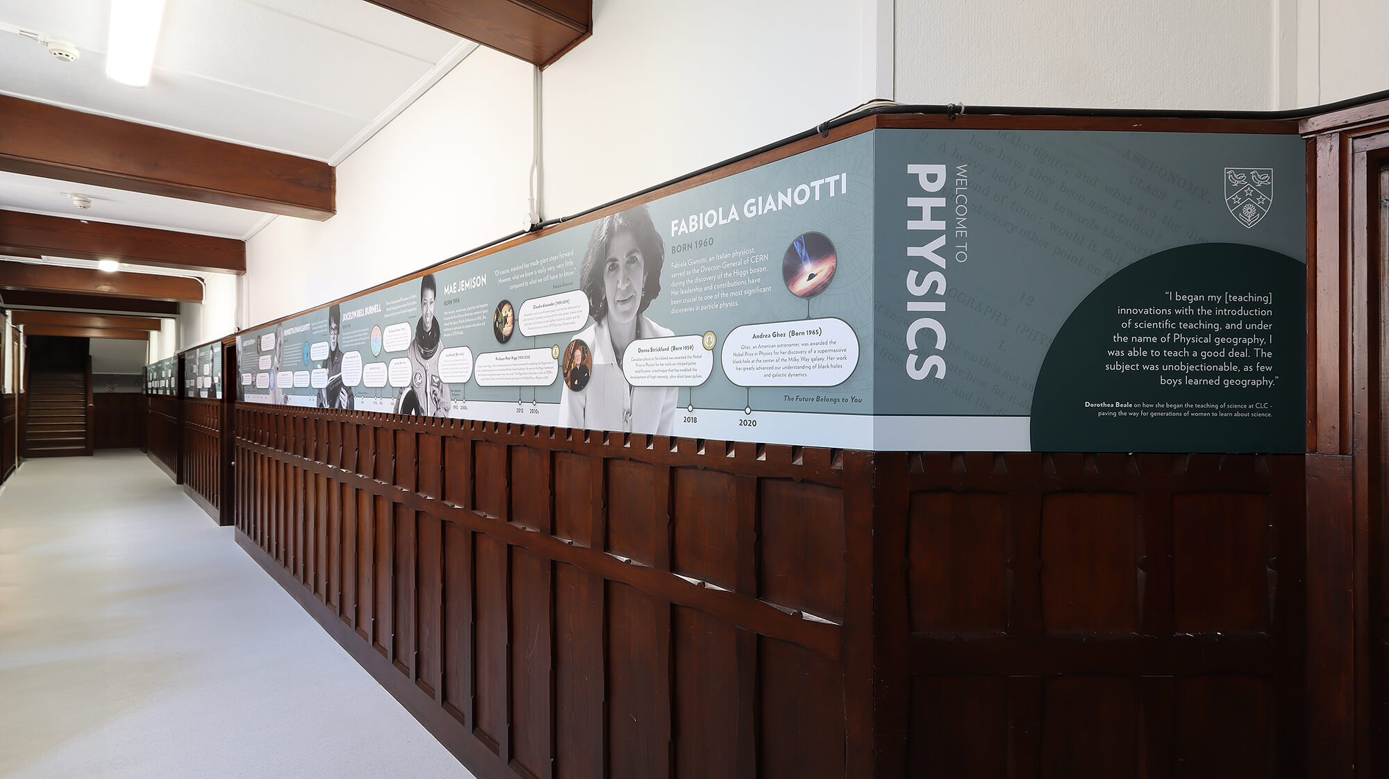 This inspiring wall graphic at Cheltenham Ladies' College features a curated collection of influential figures and important milestones, offering an eye-catching introduction to their physics department. The colors align with the school's brand while subtly complementing the distinctive interior design of the corridors.