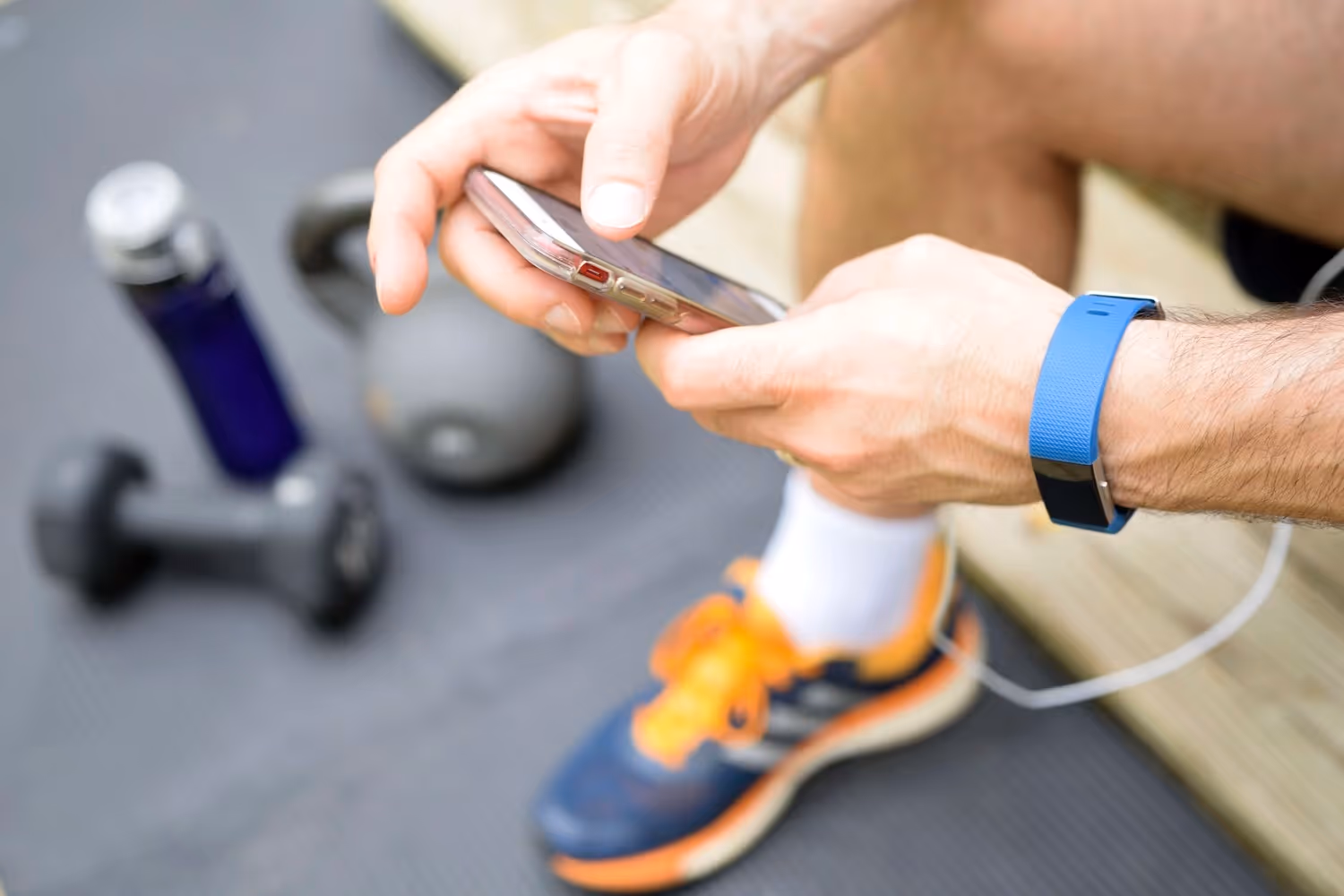 Fit person checking their phone