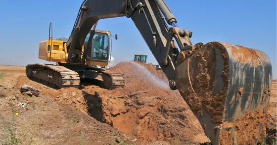excavator digging a hole