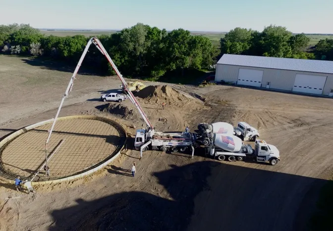 aerial view of pump truck at new grain bin site