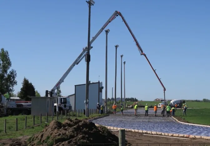 pump truck and workers installing new track