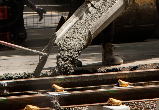 crew pouring concrete