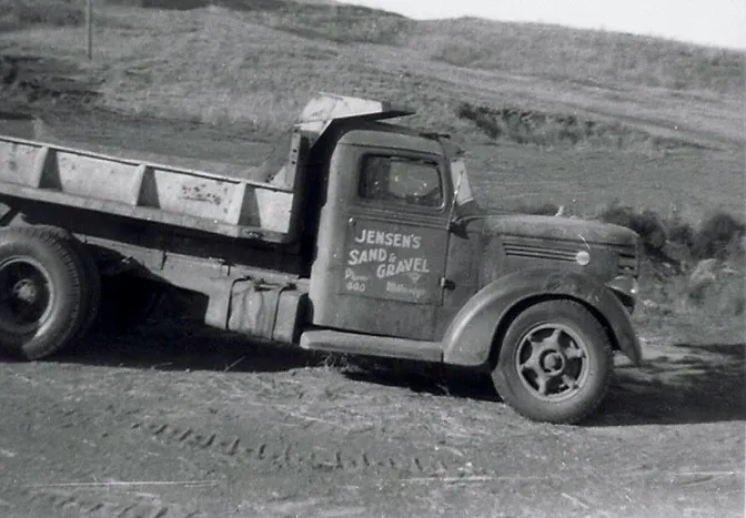 chip seal crew working on a road