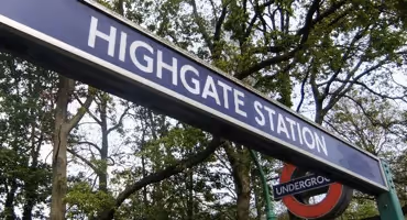 The sign for Highgate Station outside the tube station.