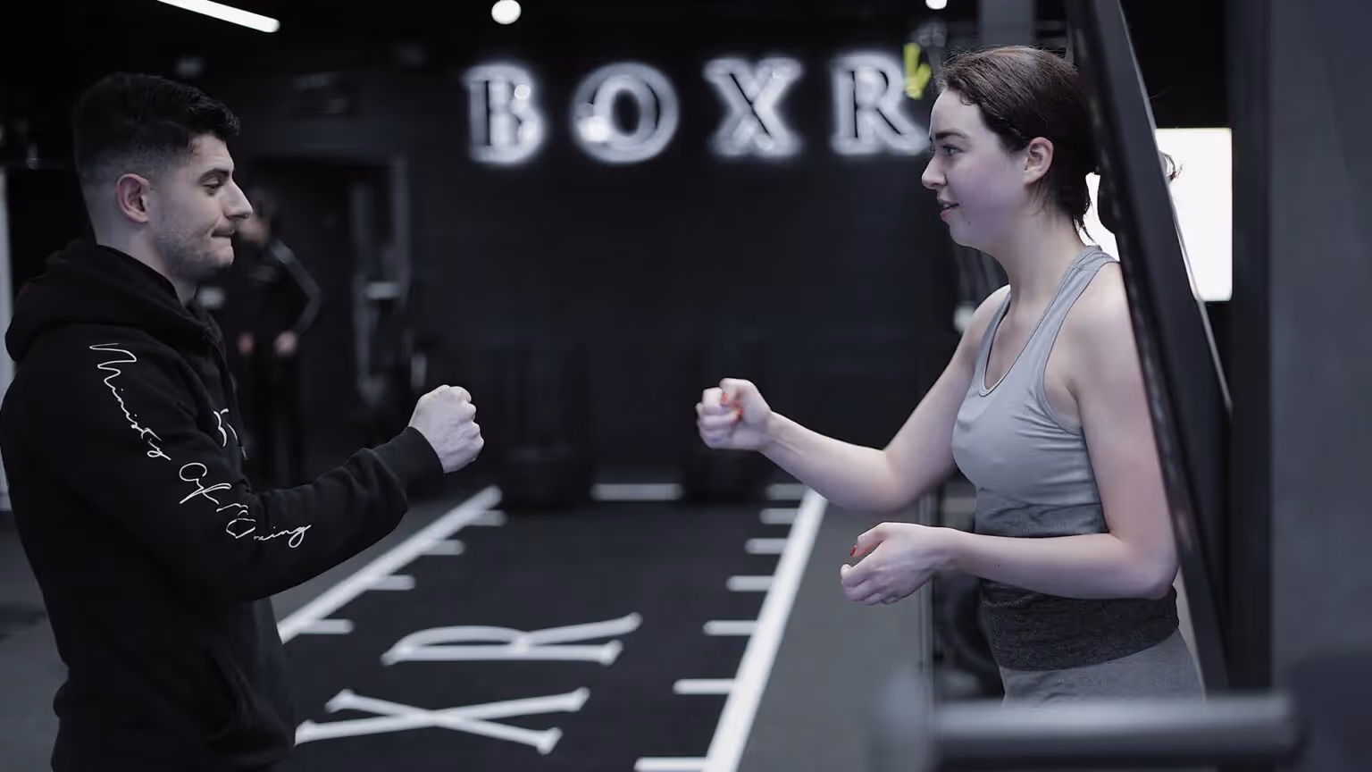 Group of 12 women in a sweat class at Boxr gym in Mill Hill.