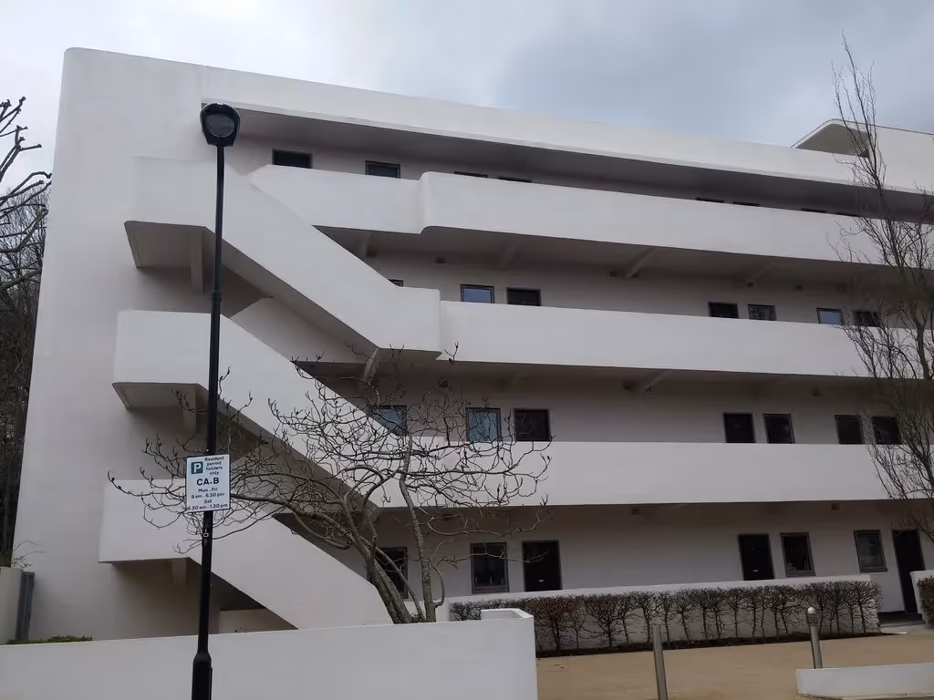 People walking out of the Isokon Gallery in Belsize Park.