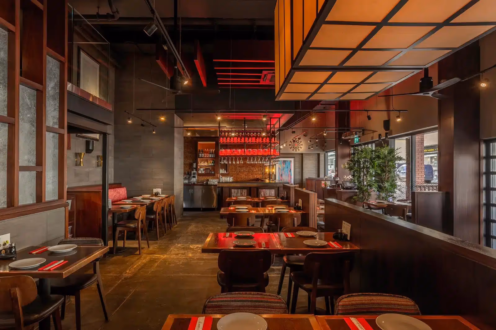 A large group of people dining at Sushimania in Finchley.