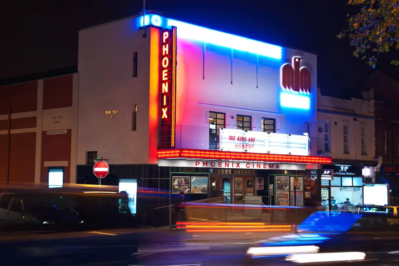 Neon lit exterior of Phoenix Cinema in East Finchley.