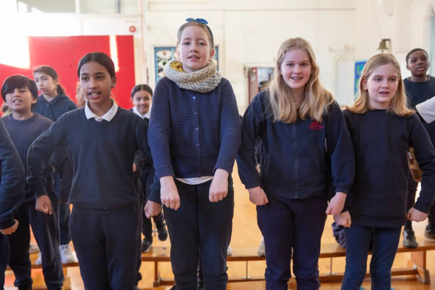Group photo of pupils and David Beckham when he visited Church of England primary school in Kentish Town.