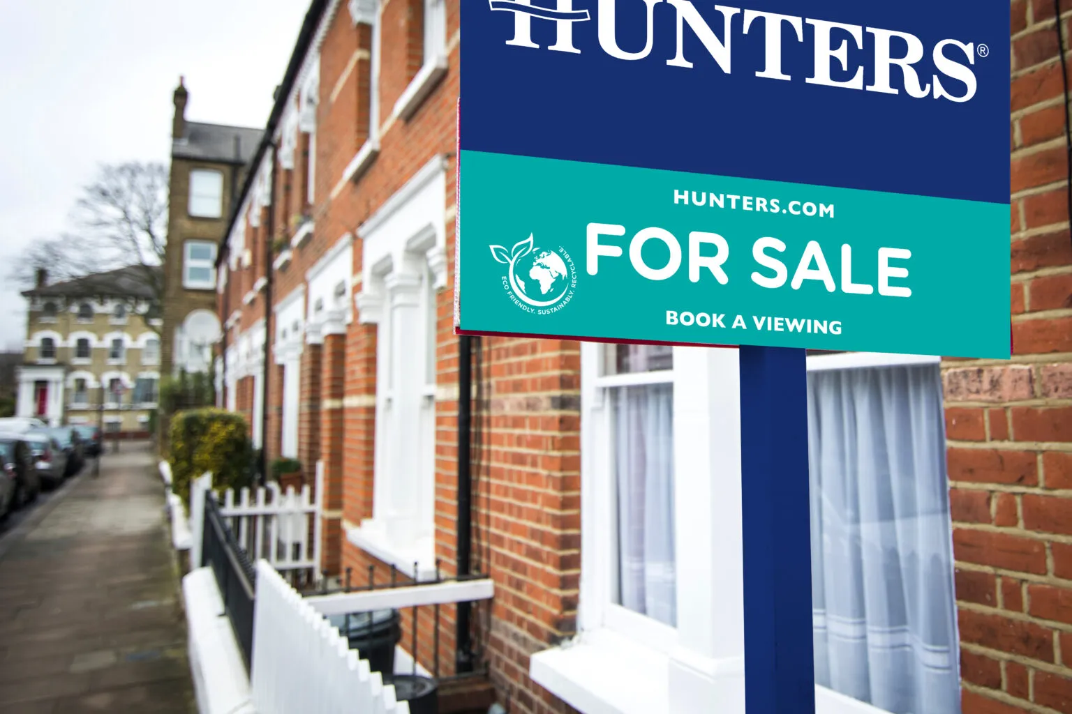 Blue shop front for Hunters estate agent in South London.
