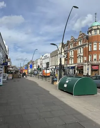 Blue shop front for North West 6 in Kilburn.