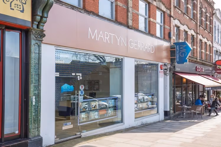 Outside of Martyn Gerrard estate agents in Mill Hill.