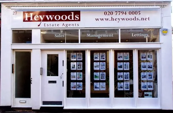 All white shop front of Heywoods in Belsize Park.
