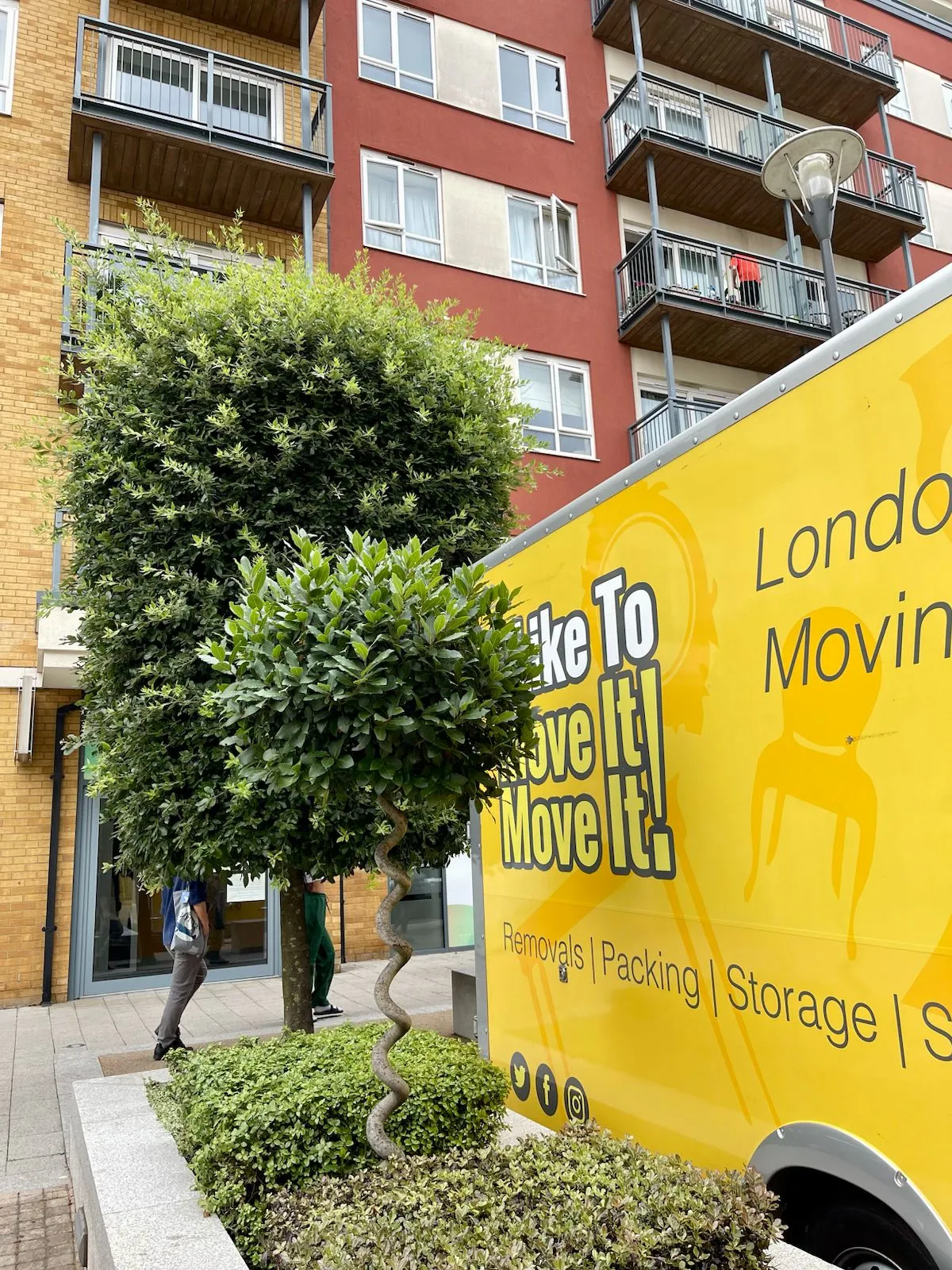 Man and van crew outside block of modern purpose built flats near Hendon NW4 | I Like to Move it Move it