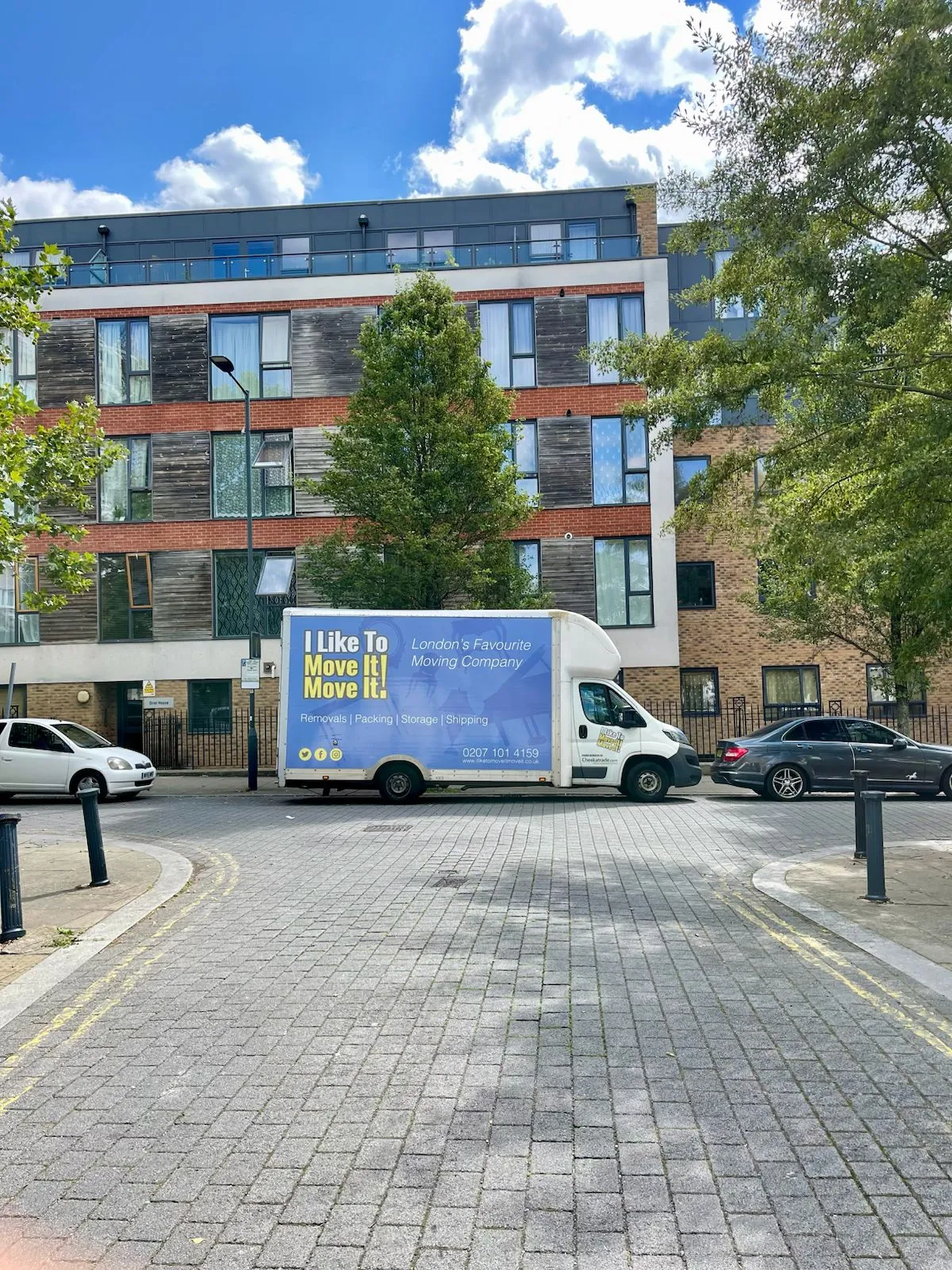 Man with a Van service making a collection from modern flats at the end of St Julian’s Road, Kilburn NW6 | I Like To Move It Move It