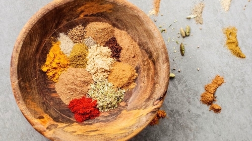 Ras el hanout is a complex, aromatic Moroccan spice blend that's so famously associated with Moroccan cuisine, it always makes the list of foods to bring back from a trip to Morocco. The literal translation of ras el hanout from Arabic to English is “head of the shop," implying that this mix of spices is the very best offering in a spice shop. Due to its liberal use in mrouzia, a lamb and honey dish with intense seasoning, ras el hanout is also sometimes called mrouzia spice. No two versions of this spice blend are the same, so if sampling ras el hanout from different sources, you'll notice slight flavor variations. While most recipes include cardamom, nutmeg, anise, mace, cinnamon, ginger, various peppers, and turmeric, a total of 30 or more ingredients might be used in varying quantities.