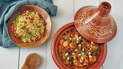 A tajine or tagine is a Maghrebi dish which is named after the earthenware pot in which it is cooked. It is also called maraq or marqa. The tagine dates back to the time of Harun al-Rashid, the fifth Abbasid Caliph. The earliest writings about the concept of cooking in a tajine appear in the famous One Thousand and One Nights, an Arabic-language story collection from the ninth century. Today, the cooking-pot and its traditional broth are primarily prepared in the Middle East and North Africa. In North Africa, it is called a tajine, while in the Middle East it is called a maraq (broth) or a qidra (cooking pot). There are different ways to prepare the tajine. In the original qidra style, saman (clarified butter) is used to lubricate the surface and a puree of chopped onion is added for flavour and aroma. For muqawlli-style cooking, the ingredients are placed in olive oil to enrich the flavours.