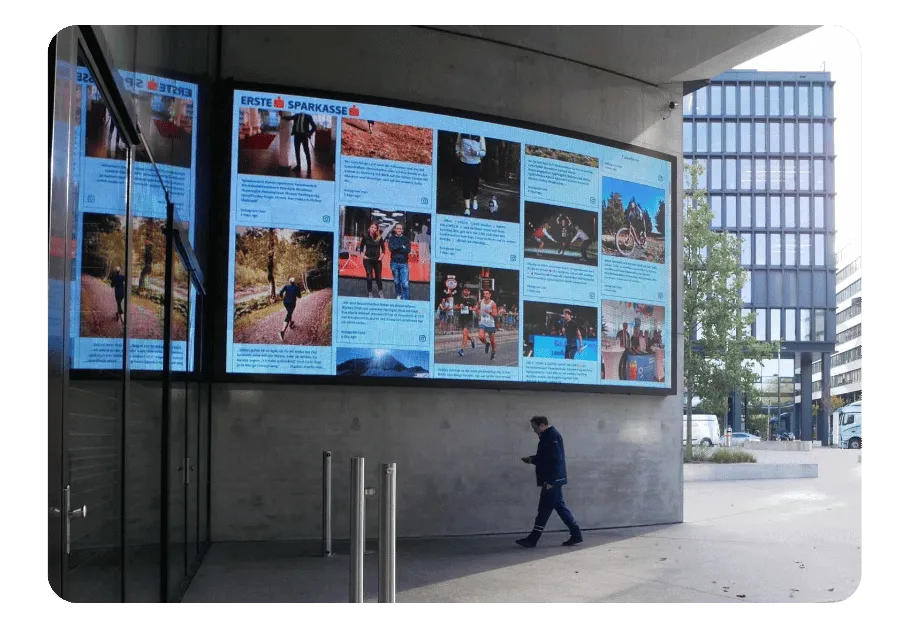 digital signage content displayed on a social media wall outside Erste Bank in Vienna