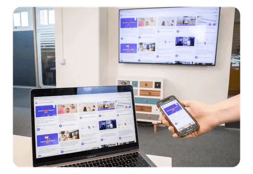 A social wall displayed on a laptop, a TV and a phone simultaneously.