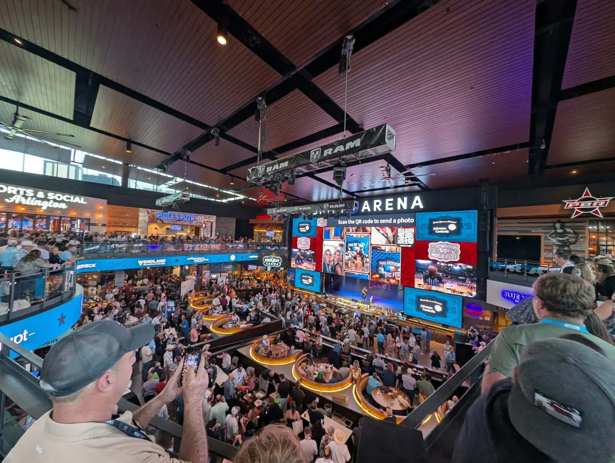 Live social media wall for events displayed on a large venue screen during an event.