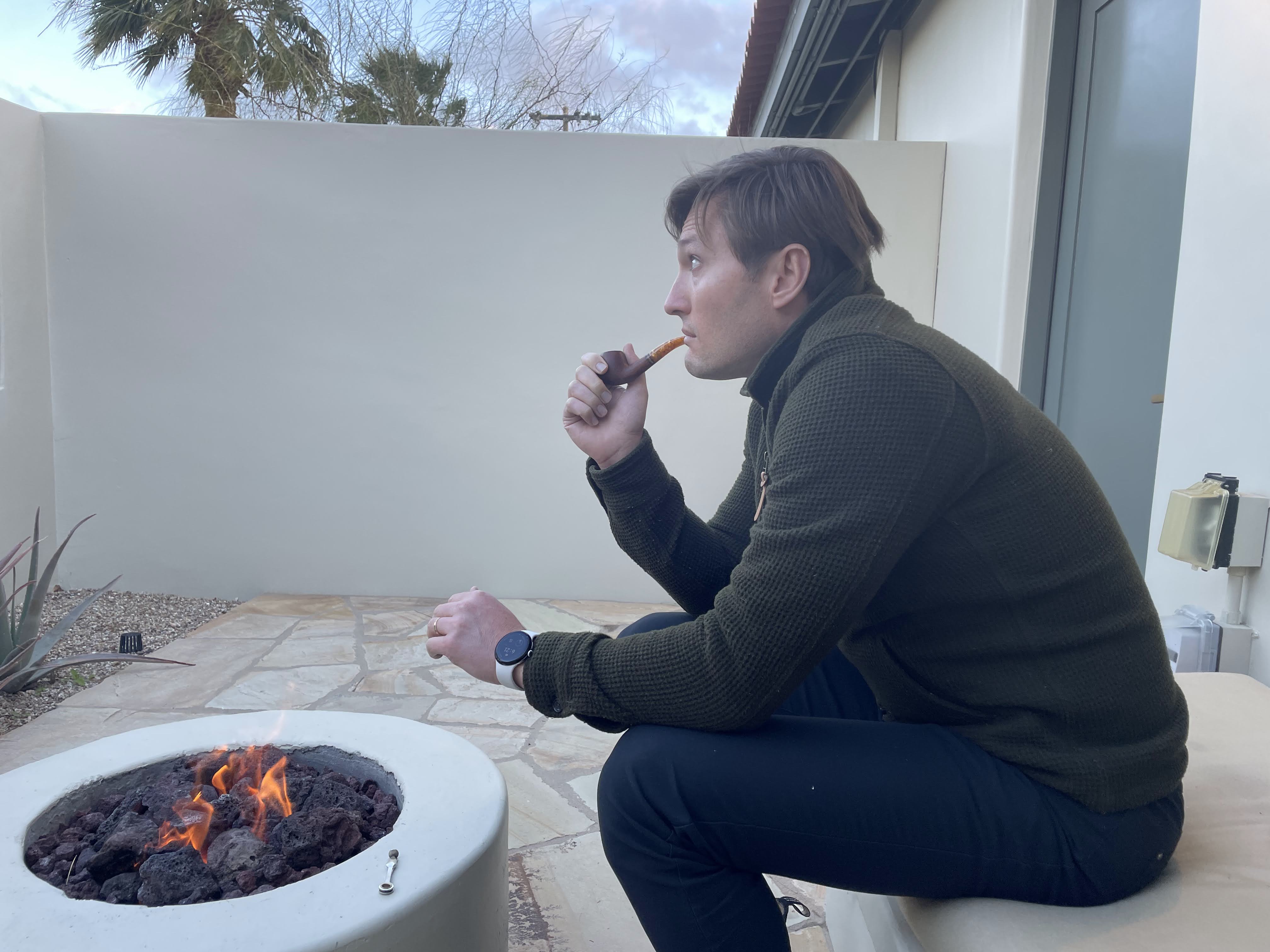 Nick smoking a pipe