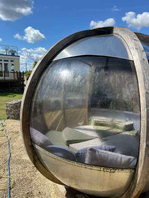 Photo of a dirty ornate garden pod at a house in Mendips